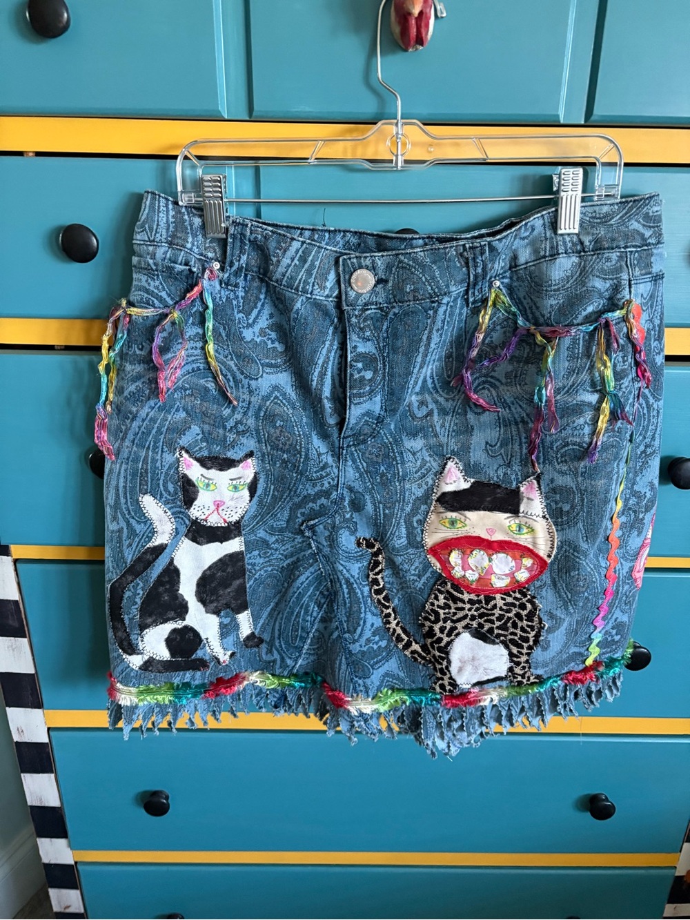Crazy artsy embellished repurposed skirt. 
Cats and shoes size 14